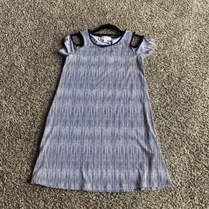 Blue and white dress with shoulder cut out.